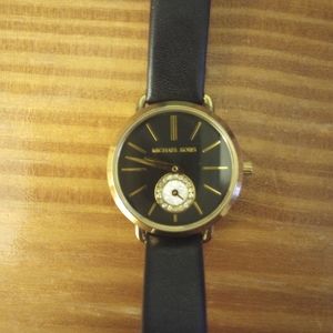 Michael Kors Women's Black and Gold Tone Stainless Steel Watch